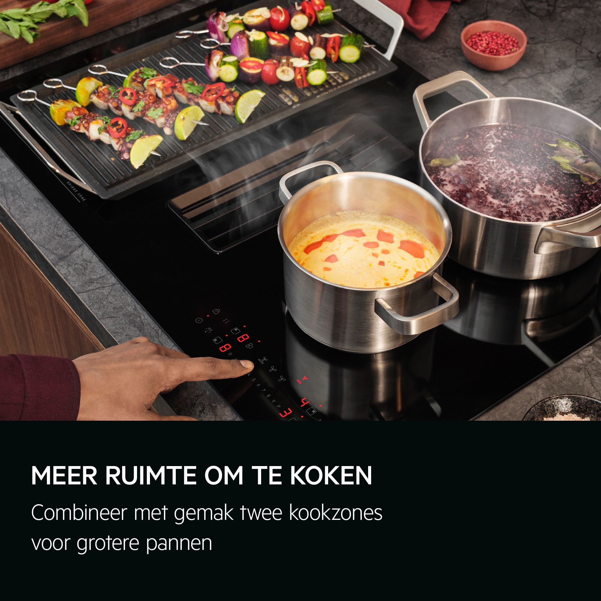 Meer ruimte om te koken Combineer met gemak twee kookzones voor grotere pannen