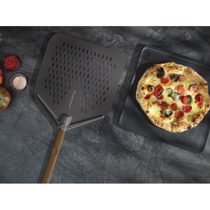 Lifestyle image of cast iron tray and peel